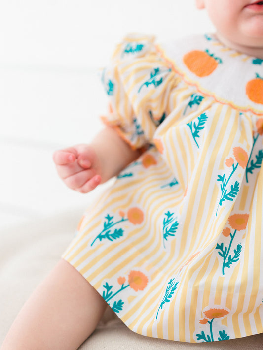 Perfect smocked diaper cover for pumpkin patches, fall festivals, family photos and school photos