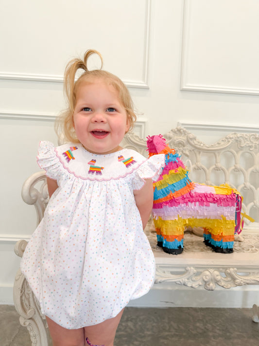 toddler wearing hand smocked pinata bubble