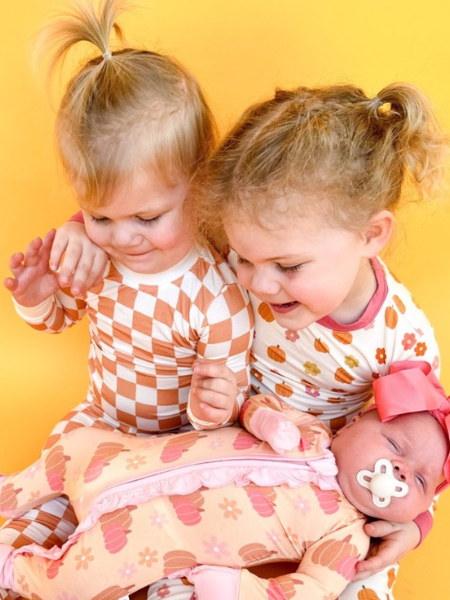 Little girls in back to school dress and bubble!