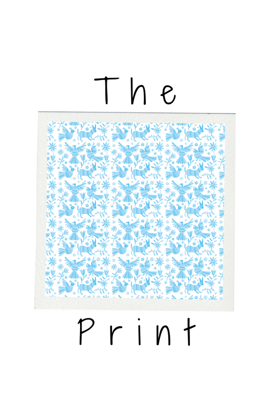a blue mexican print in a frame on a white background labeled "the print".