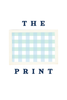Framed checkered print with 'The Print' text on a white background