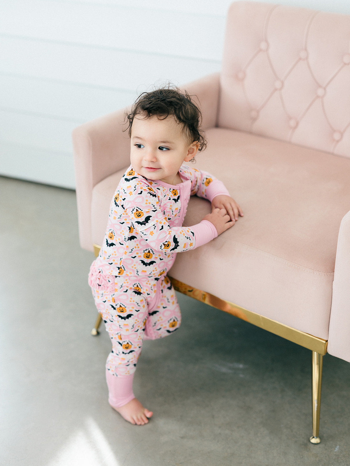 Midnight Pumpkins Ruffle Romper