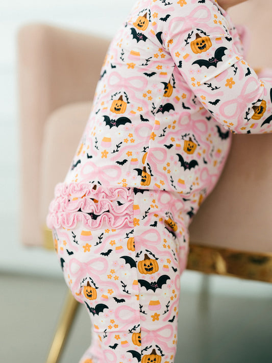 Midnight Pumpkins Ruffle Romper