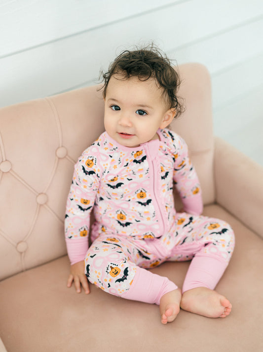 Midnight Pumpkins Ruffle Romper