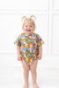 Toddler in pink and orange butterfly bamboo t shirt bubble