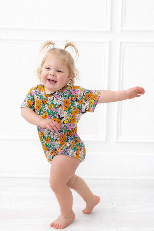 Toddler in pink and orange butterfly bamboo t shirt bubble