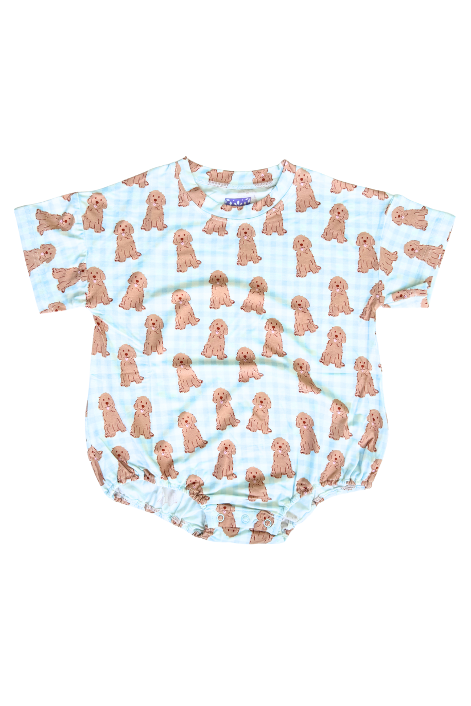 Baby romper with dog pattern on a light blue background