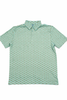 Green patterned fish polo shirt on a white background