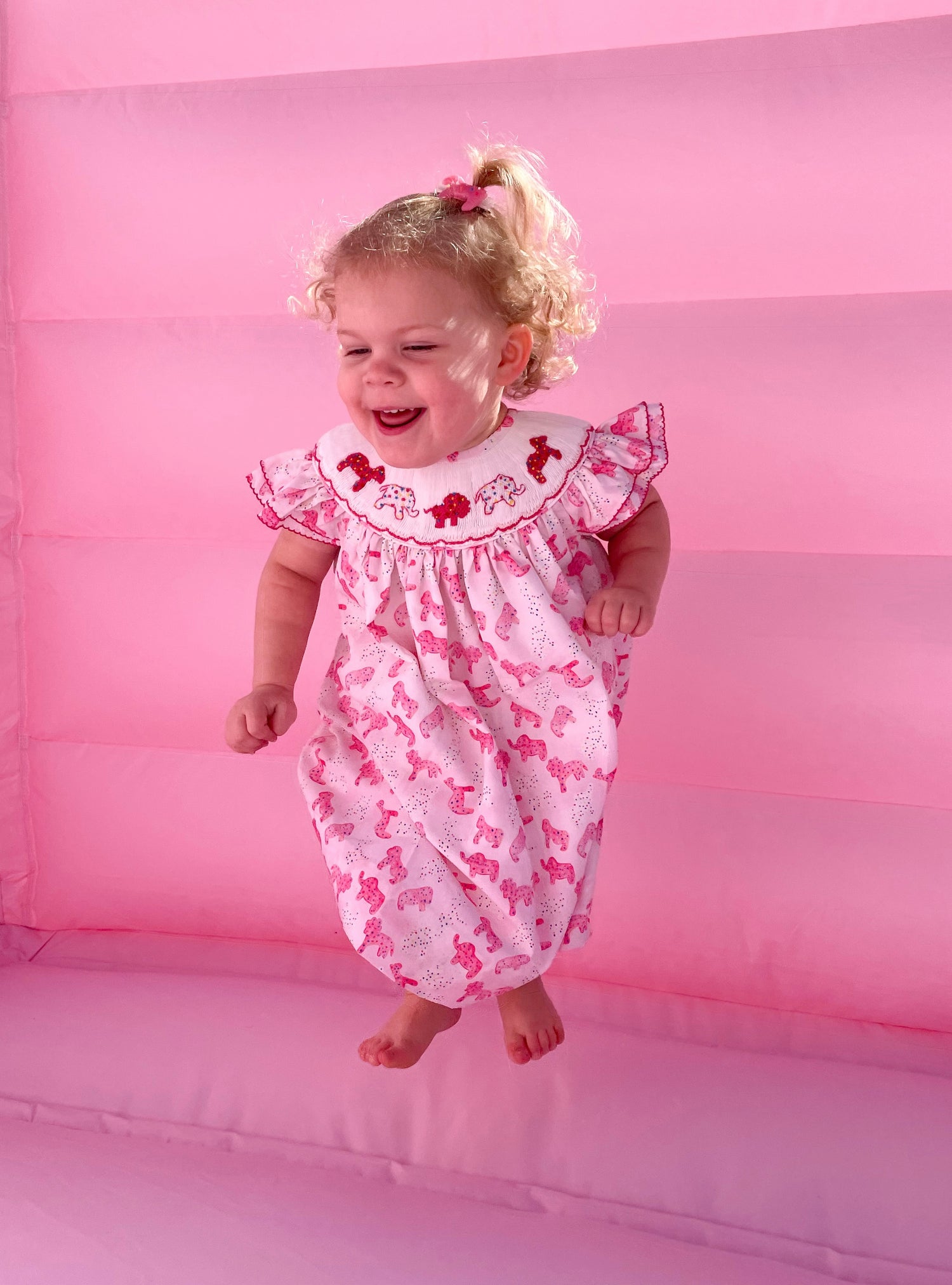pink animal cookie dress on toddler 